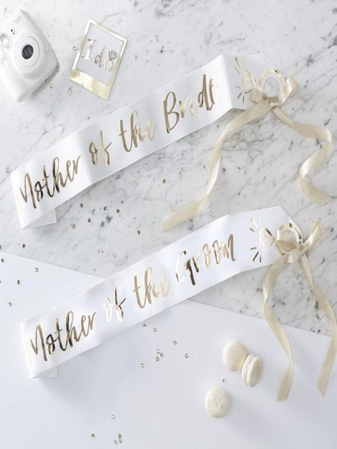 pack of two white sashes with Mother of the Bride and Mother of the groom  gold foiled printed text  